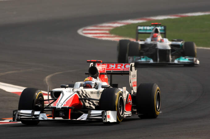 Karthikeyan-und-Schumacher-GP-Indien-Delhi-29-10-2011-fotoshowImage-7a7239f1-547983.jpg